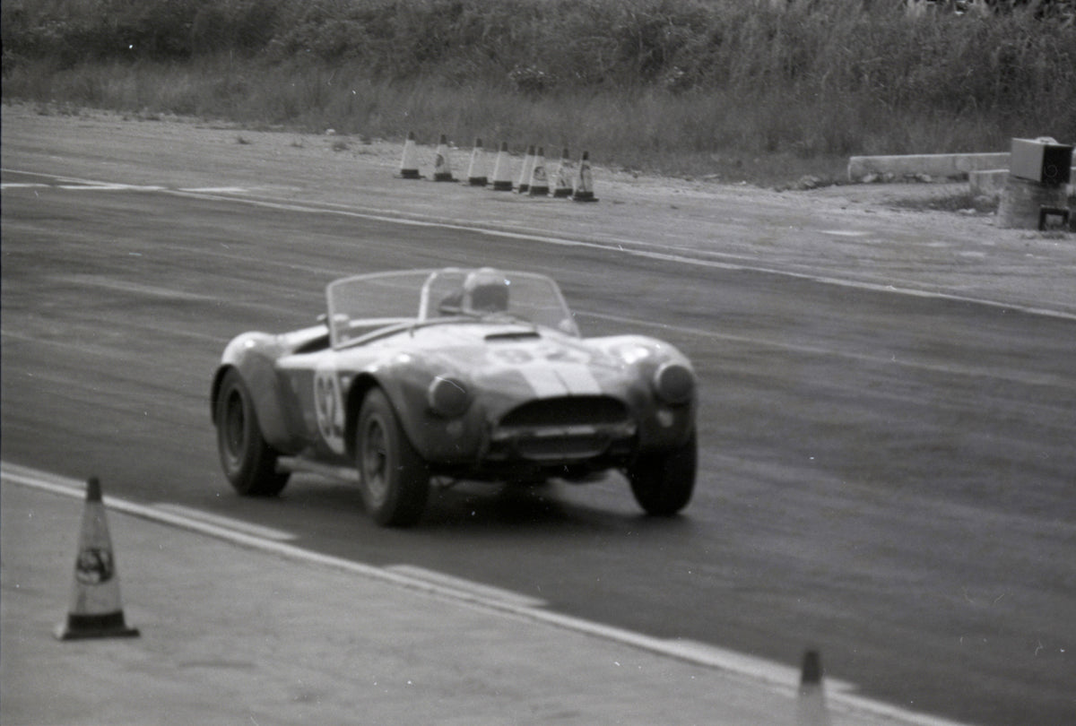 1964 Cobra number 98 on track — Nassau — 0064-0018
