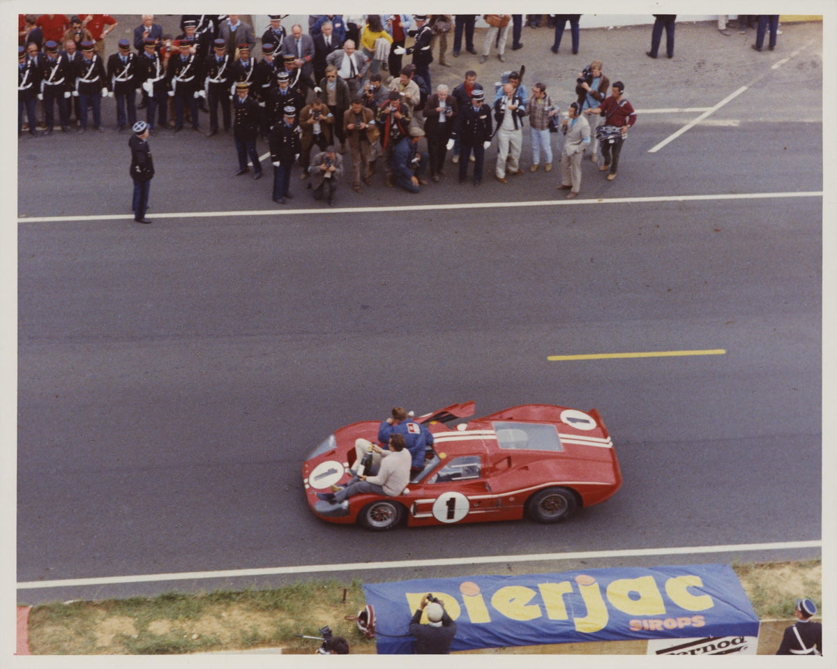 1967 — A. J. Foyt and Dan Gurney with Ford Mark IV After Winning the 24 Hours of Le Mans Race, June 1967 — Fordimages 0067-0009; source THF134900