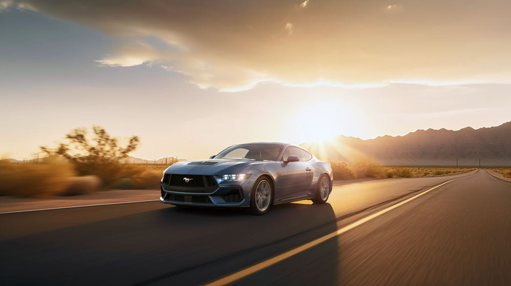C11415624 Mustang34FrntDrvrMotnDesertRdSunset mj 0144-1650
