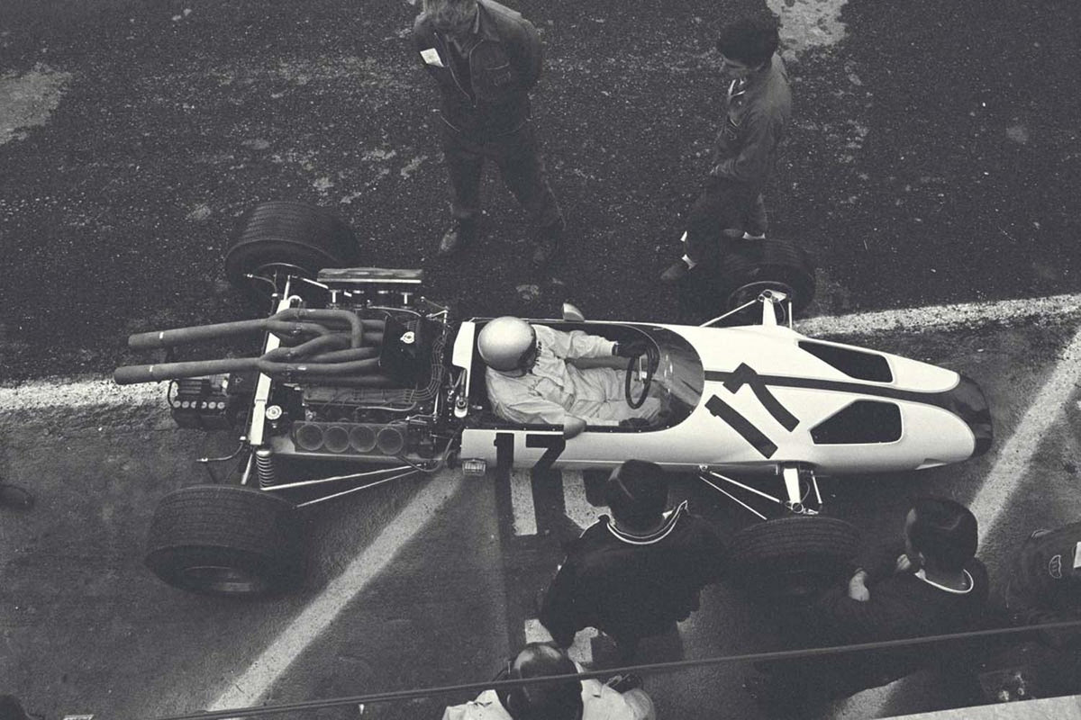 Ford Motor Company archival image documenting Formula One 1966 Ford Indianapolis DOHC engine mounted in the rear of this 1966 McLaren M2B.