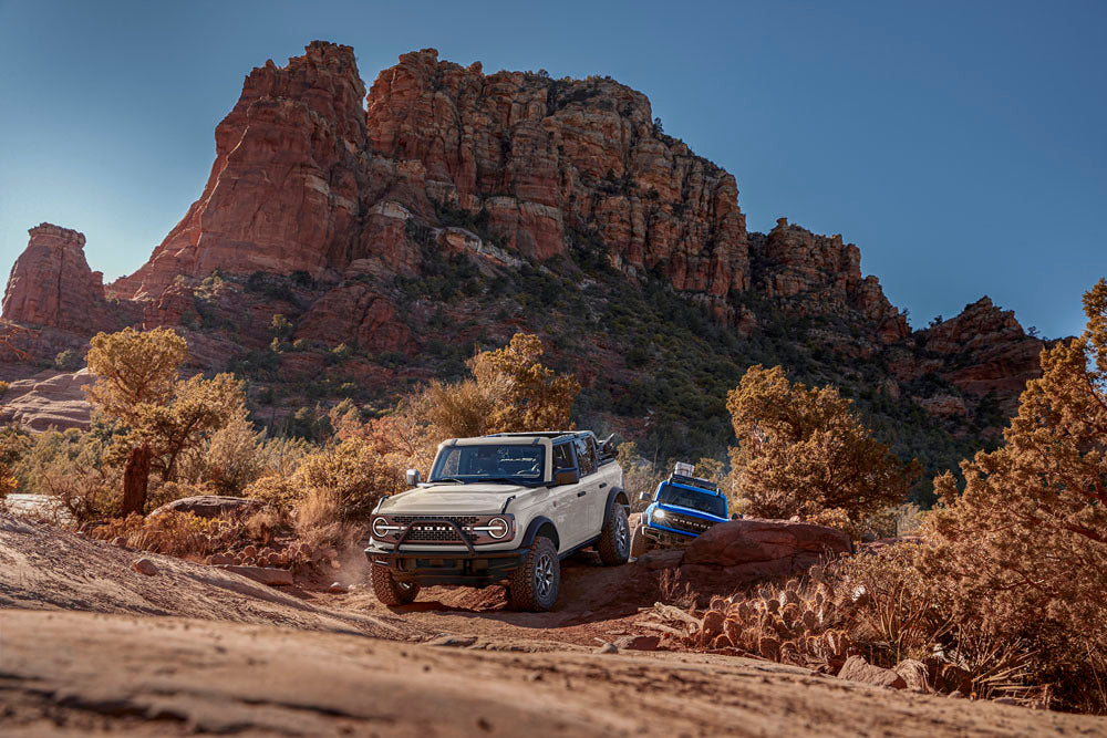 Official Ford Motor Company image featuring the 2026 Bronco Badlands and Bronco Big Bend.