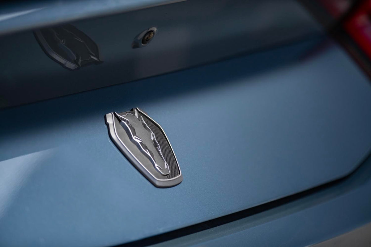 Official Ford Motor Company detail image of 2026 Mustang Dark Horse badging.