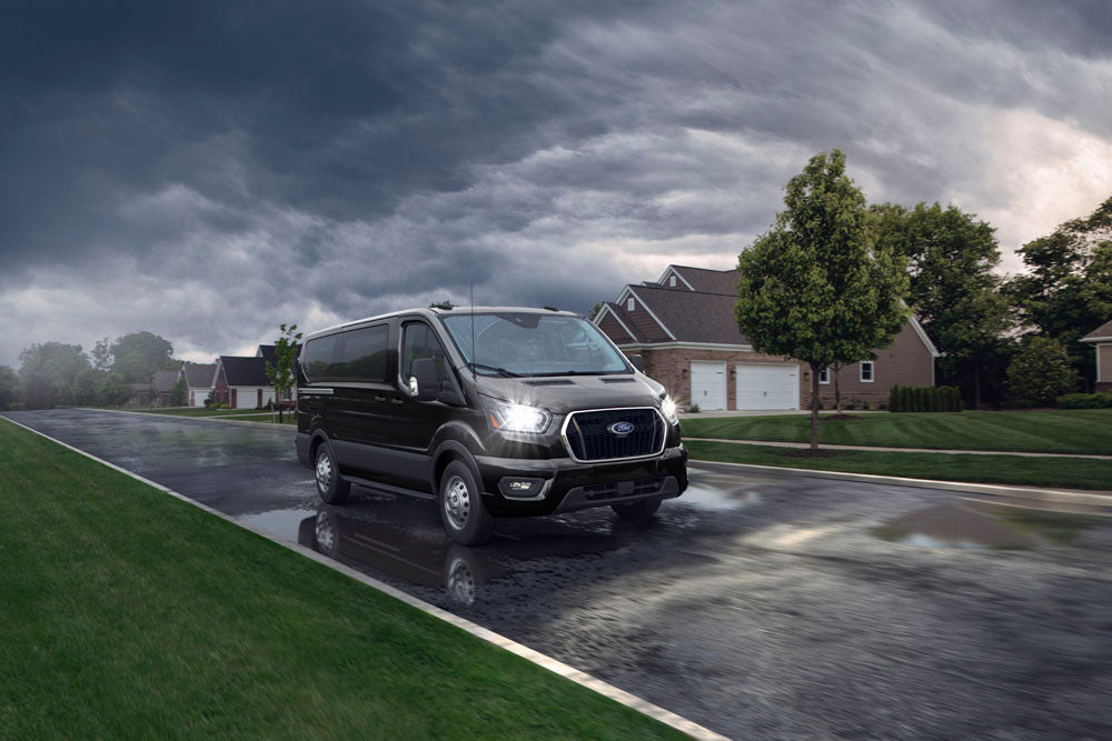 Official Ford Motor Company image of the 2026 Ford Transit XLT passenger van.