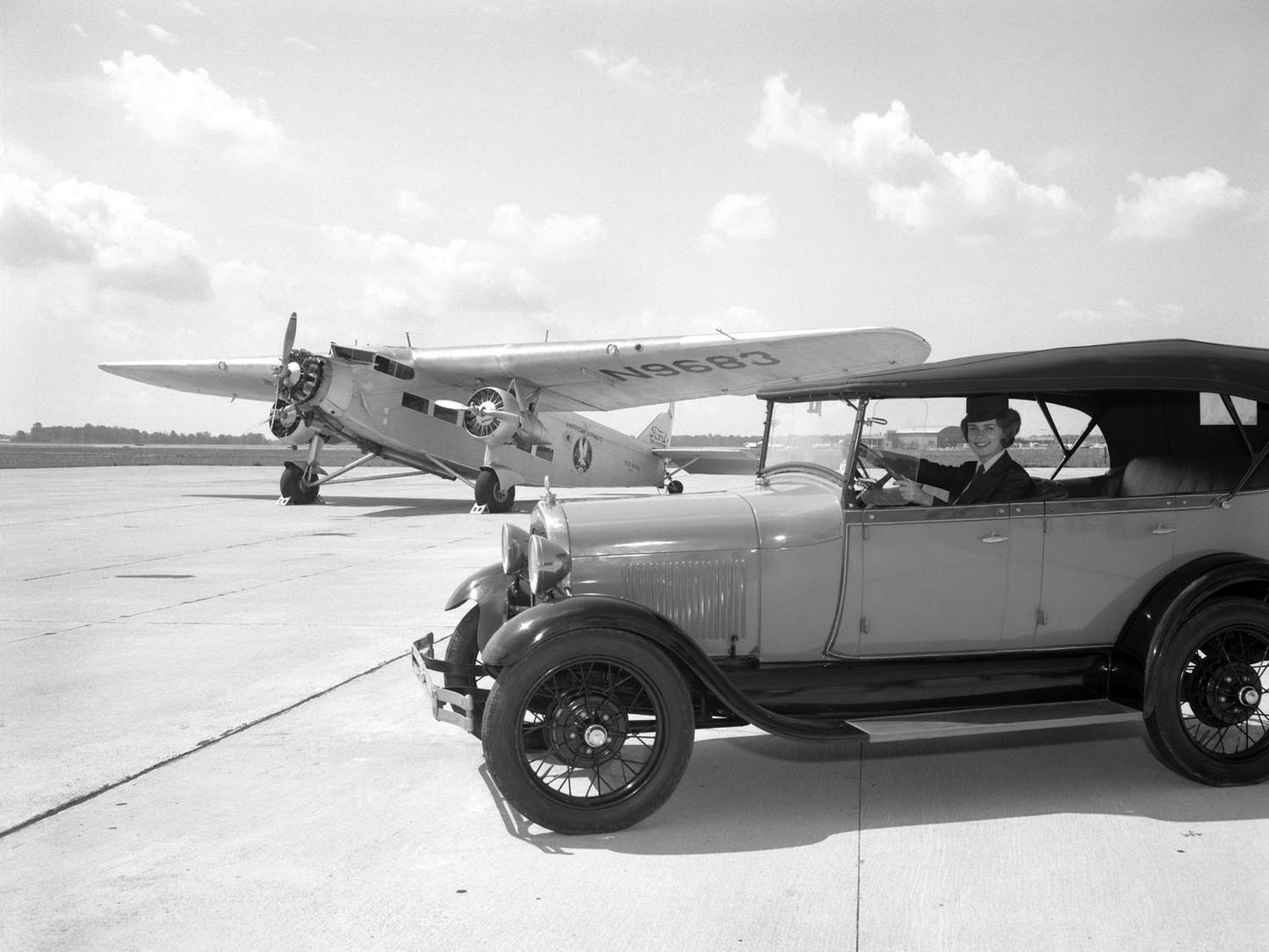 1928 Ford Model A and Tri Motor airplane 0400-9192