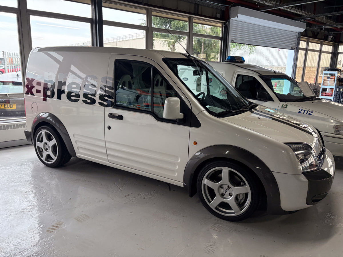 This archival image documents the 2004 Ford Transit Connect X-Press and is preserved in the Ford Heritage Vault as part of Ford Motor Company's historic photographic archive. Free for personal, non-commercial use. Ford Heritage Vault reference AR-...