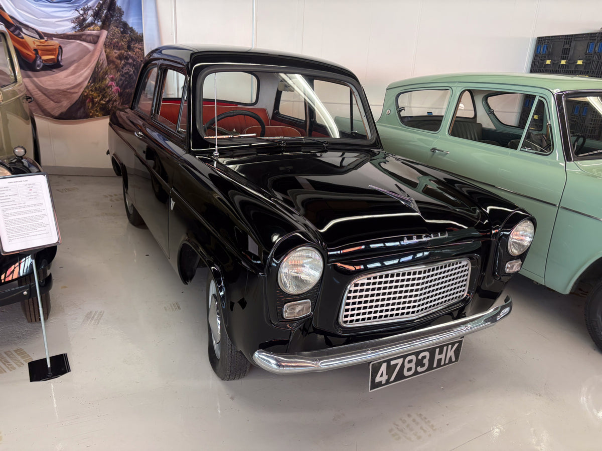 This archival image documents the 1958 Ford Anglia 100E and is preserved in the Ford Heritage Vault as part of Ford Motor Company's historic photographic archive. Free for personal, non-commercial use. Ford Heritage Vault reference AR-2024-9.4.5.