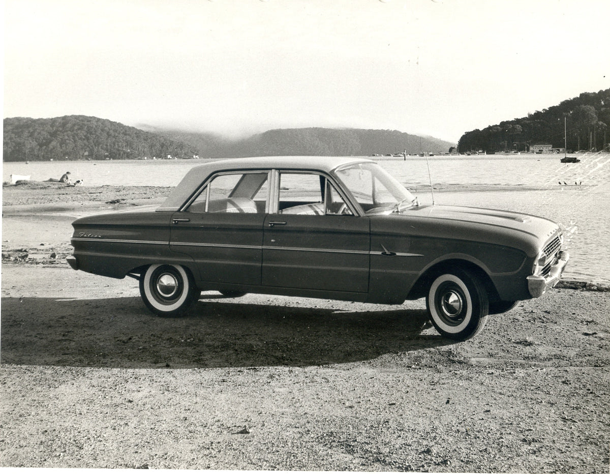 This archival image documents the 1962 Ford XL Falcon on scenic beach and is preserved in the Ford Heritage Vault as part of Ford Motor Company's historic photographic archive. Free for personal, non-commercial use. Ford Heritage Vault reference A...
