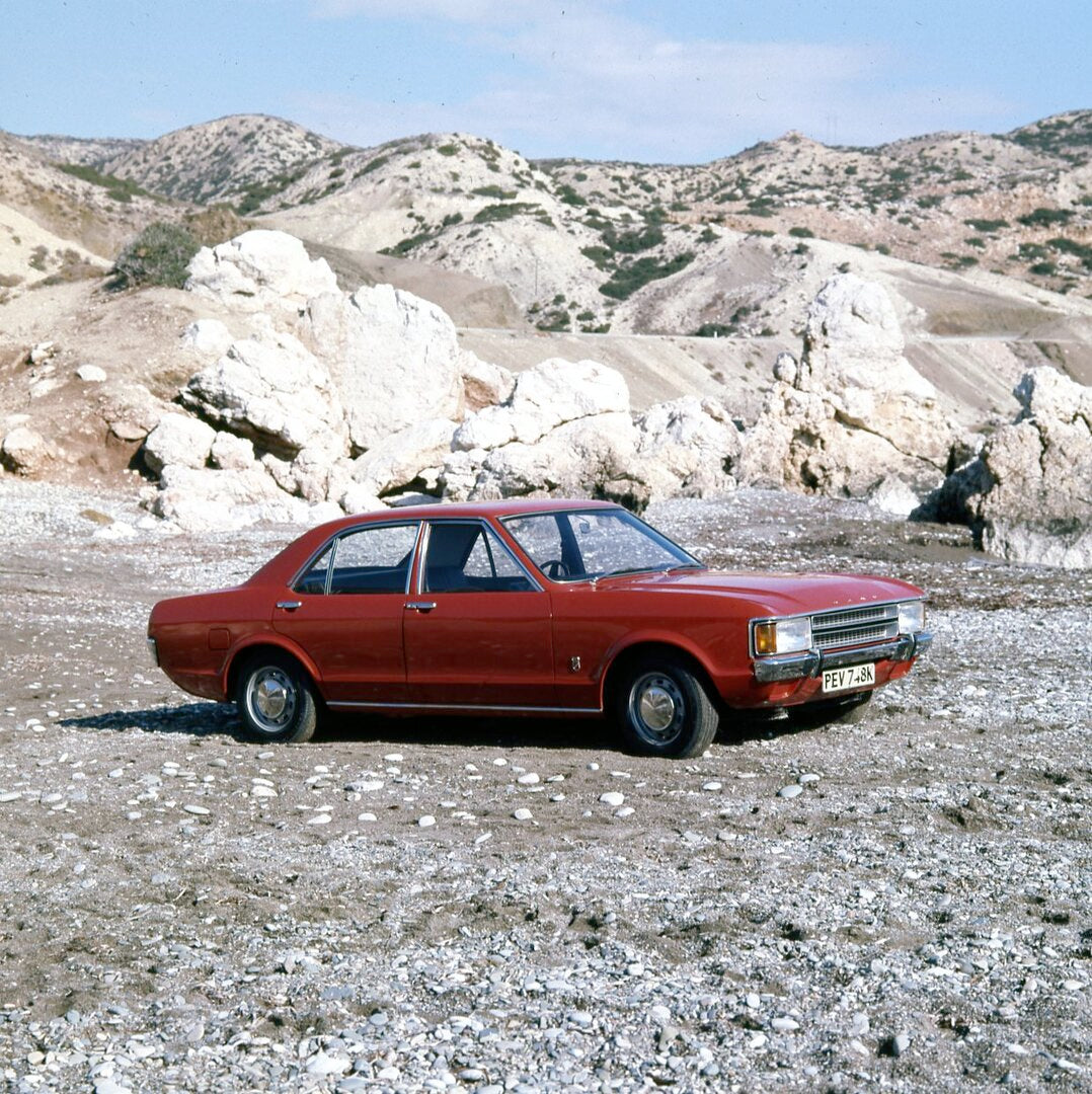 This archival image documents the 1972 Ford Consul 4 door in scenic rocky area and is preserved in the Ford Heritage Vault as part of Ford Motor Company's historic photographic archive. Free for personal, non-commercial use. Ford Heritage Vault re...