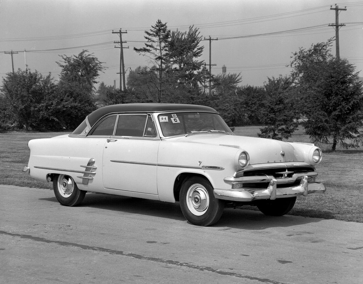 This archival image documents the 1953 Meteor Crestline Victoria Coupe on scenic road AR-2007-5 and is preserved in the Ford Heritage Vault as part of Ford Motor Company's historic photographic archive. Free for personal, non-commercial use. Ford ...
