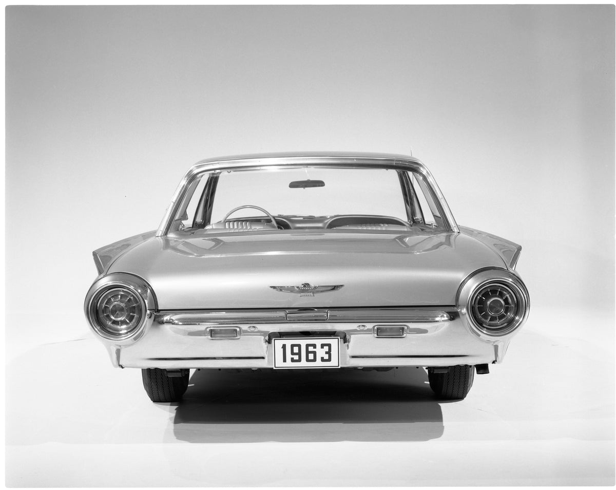 This archival image documents the 1963 Ford Thunderbird hardtop rear view in studio and is preserved in the Ford Heritage Vault as part of Ford Motor Company's historic photographic archive. Free for personal, non-commercial use. Ford Heritage Vau...