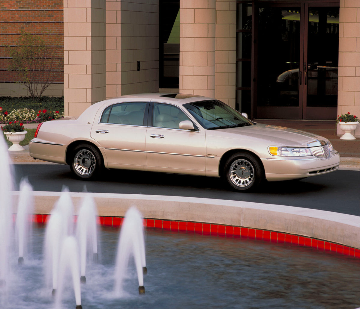 This archival image documents the 2002 Lincoln Town Car Cartier edition with fountain CN335021 and is preserved in the Ford Heritage Vault as part of Ford Motor Company's historic photographic archive. Free for personal, non-commercial use. Ford H...