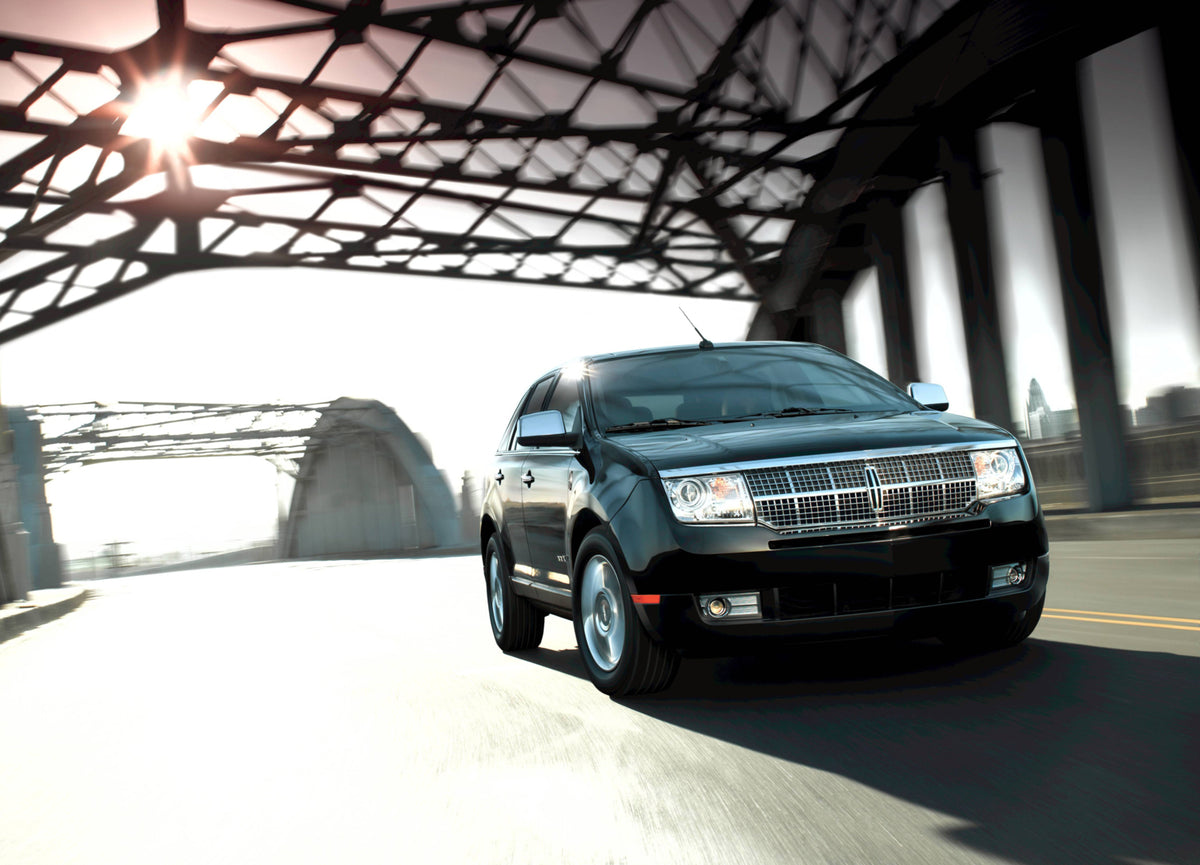 This archival image documents the 2009 Lincoln MKX action shot on bridge MS5031 and is preserved in the Ford Heritage Vault as part of Ford Motor Company's historic photographic archive. Free for personal, non-commercial use. Ford Heritage Vault r...