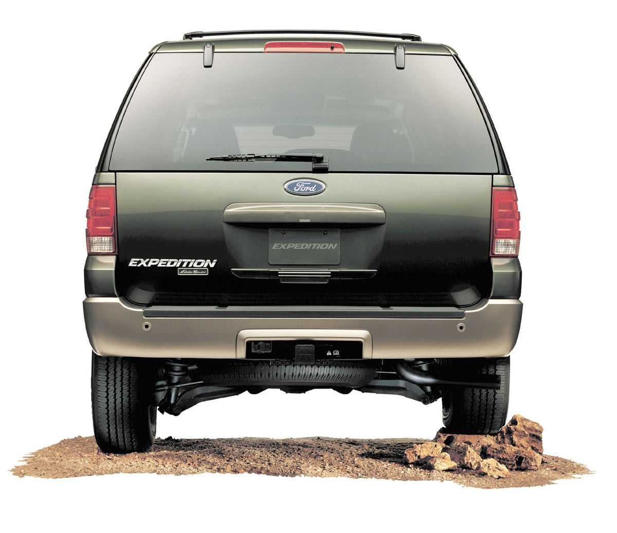 This archival image documents the 2003 Ford Expedition rear view in studio with sand MS6011 and is preserved in the Ford Heritage Vault as part of Ford Motor Company's historic photographic archive. Free for personal, non-commercial use. Ford Heri...