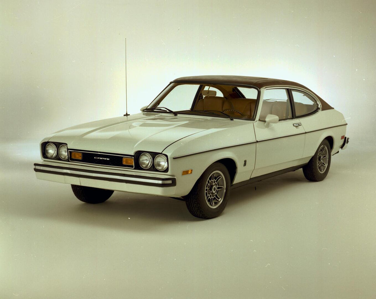 This archival image documents the 1975 Ford Capri II Ghia in studio CN9012-77 1975 and is preserved in the Ford Heritage Vault as part of Ford Motor Company's historic photographic archive. Free for personal, non-commercial use. Ford Heritage Vaul...