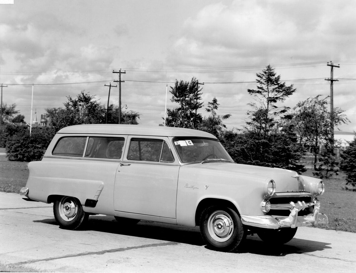 This archival image documents the 1952 Meteor Ranch Wagon on scenic road with trees AR-2007-5 and is preserved in the Ford Heritage Vault as part of Ford Motor Company's historic photographic archive. Free for personal, non-commercial use. Ford He...