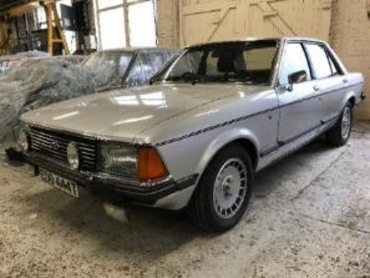 This archival image documents the 1984 Ford Granada Mk II 2.8i Ghia X and is preserved in the Ford Heritage Vault as part of Ford Motor Company's historic photographic archive. Free for personal, non-commercial use. Ford Heritage Vault reference A...