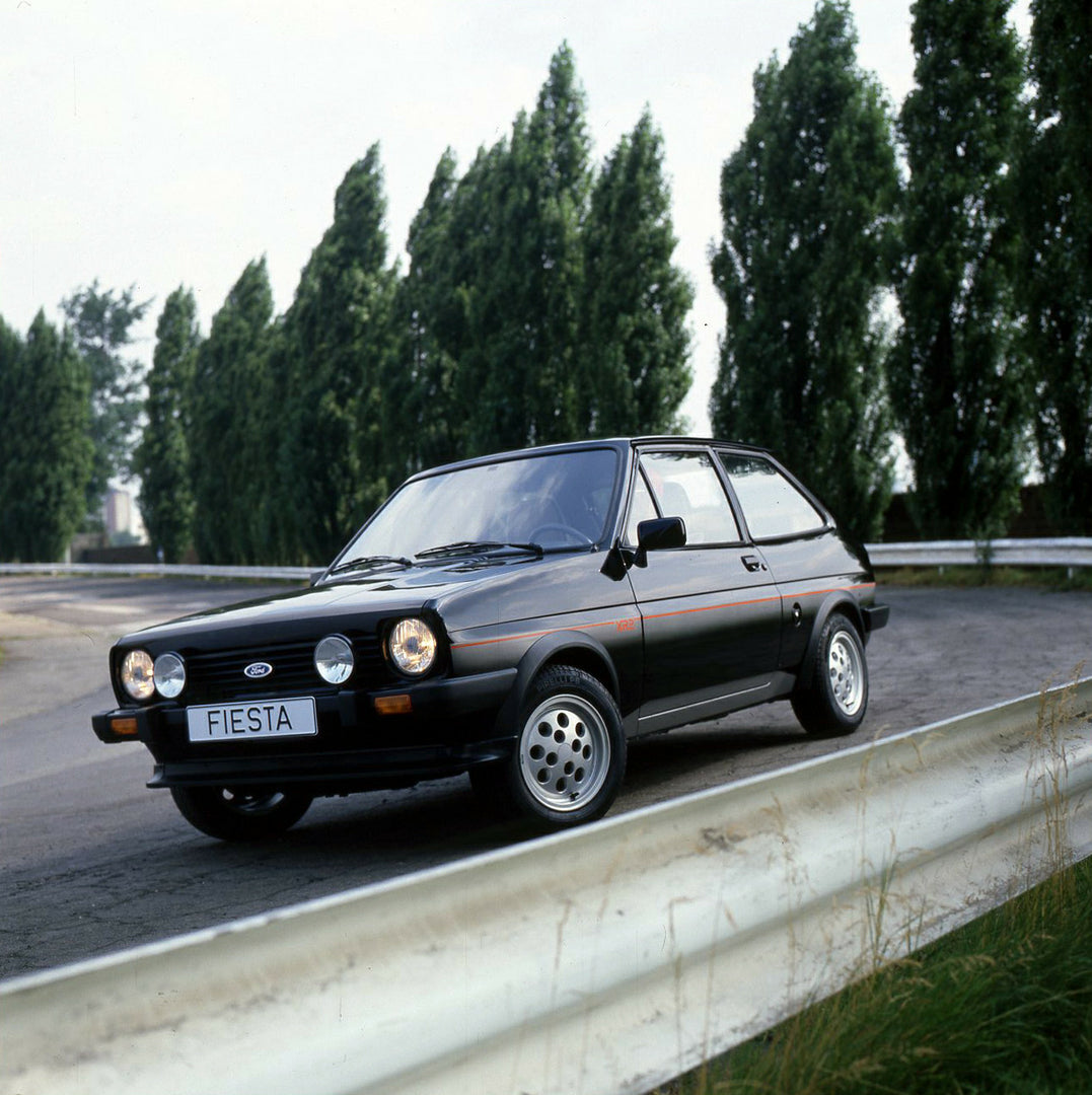 This archival image documents the 1981 Ford Fiesta XR2 LHD Mark I on scenic road and is preserved in the Ford Heritage Vault as part of Ford Motor Company's historic photographic archive. Free for personal, non-commercial use. Ford Heritage Vault ...