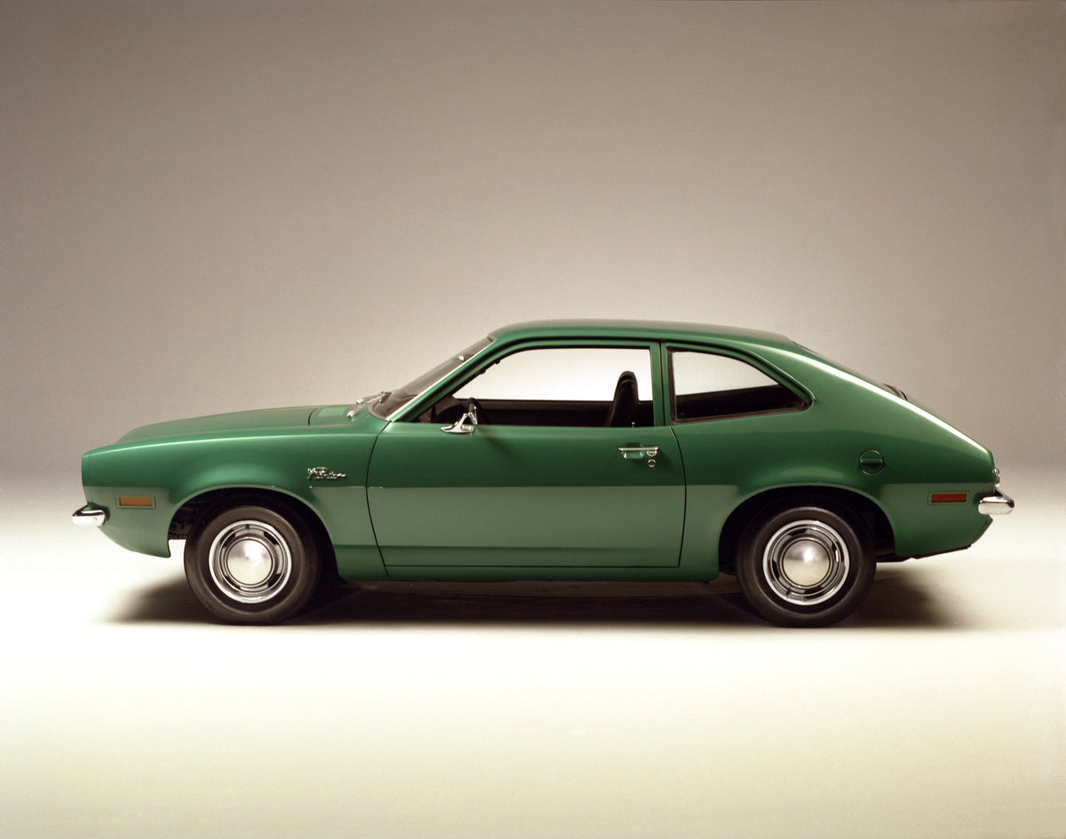 This archival image documents the 1971 Ford Pinto sedan in Dark Green and is preserved in the Ford Heritage Vault as part of Ford Motor Company's historic photographic archive. Free for personal, non-commercial use. Ford Heritage Vault reference A...