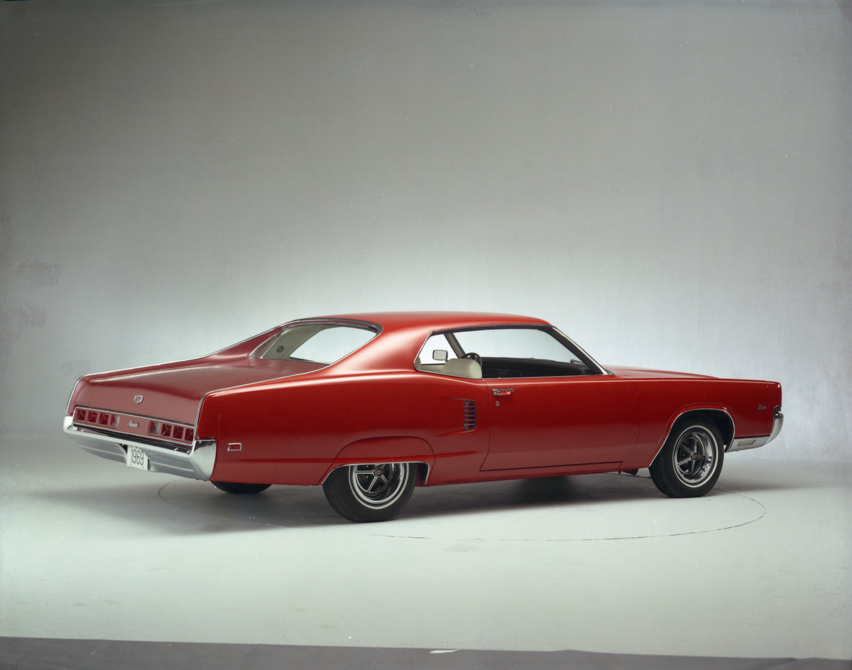 This archival image documents the 1969 Mercury Marauder X-100 Two-Door Hardtop and is preserved in the Ford Heritage Vault as part of Ford Motor Company's historic photographic archive. Free for personal, non-commercial use. Ford Heritage Vault re...