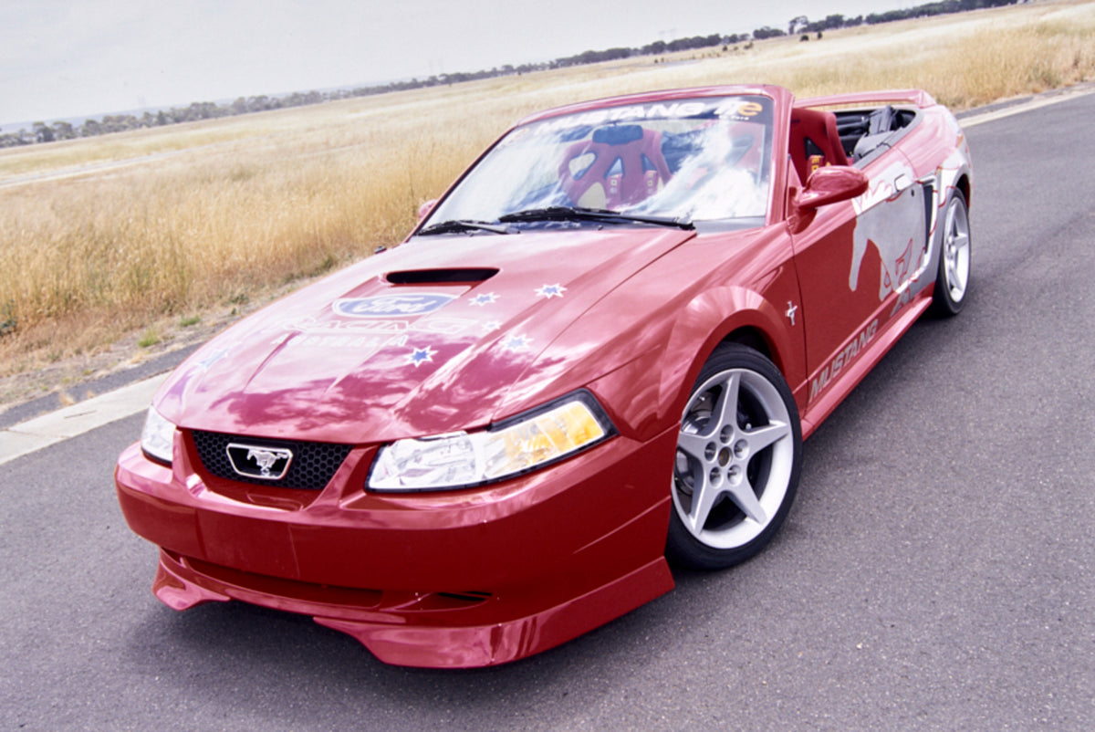 This archival image documents the 2001 Ford FTE Mustang Cobra Driver Side Front End View on Race Track FAP-2011-3 and is preserved in the Ford Heritage Vault as part of Ford Motor Company's historic photographic archive. Free for personal, non-com...
