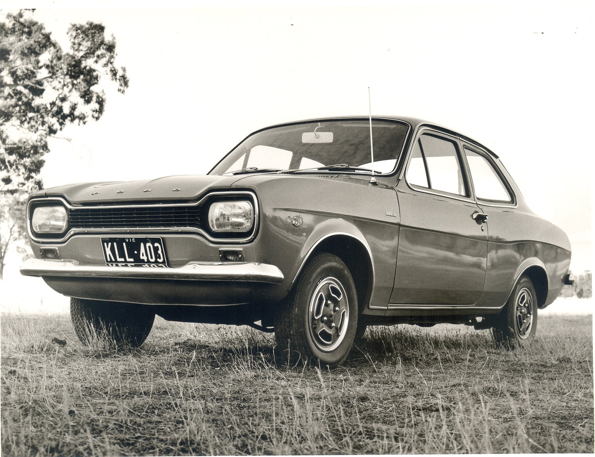 This archival image documents the 1970 Ford Escort Mark I GT low view in scenic field and is preserved in the Ford Heritage Vault as part of Ford Motor Company's historic photographic archive. Free for personal, non-commercial use. Ford Heritage V...