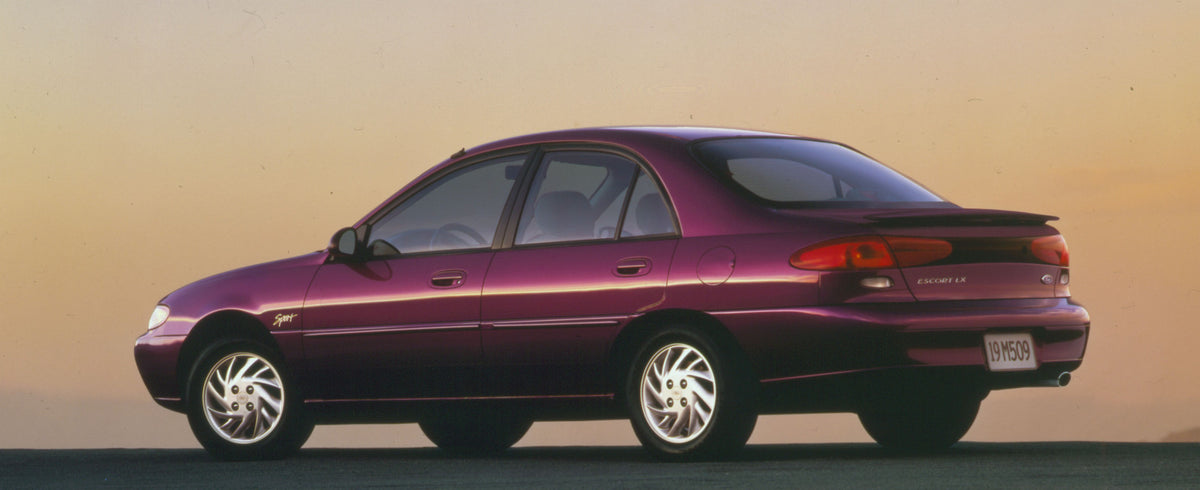 This archival image documents the 1997 Ford Escort LX Sport and is preserved in the Ford Heritage Vault as part of Ford Motor Company's historic photographic archive. Free for personal, non-commercial use. Ford Heritage Vault reference AR-2008-8.3...