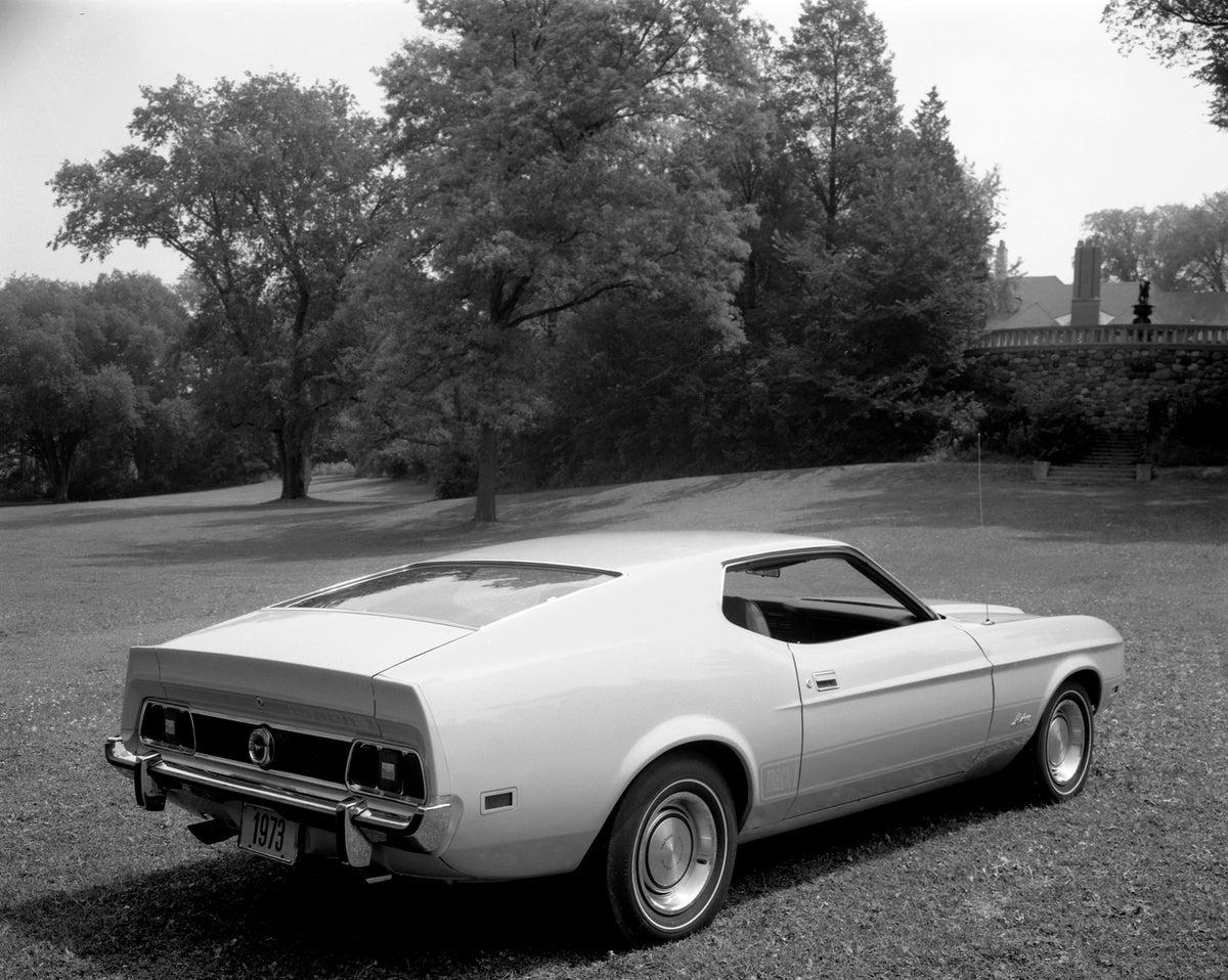 This archival image documents the 1973 Ford Mustang Mach 1 fastback and is preserved in the Ford Heritage Vault as part of Ford Motor Company's historic photographic archive. Free for personal, non-commercial use. Ford Heritage Vault reference AR-...