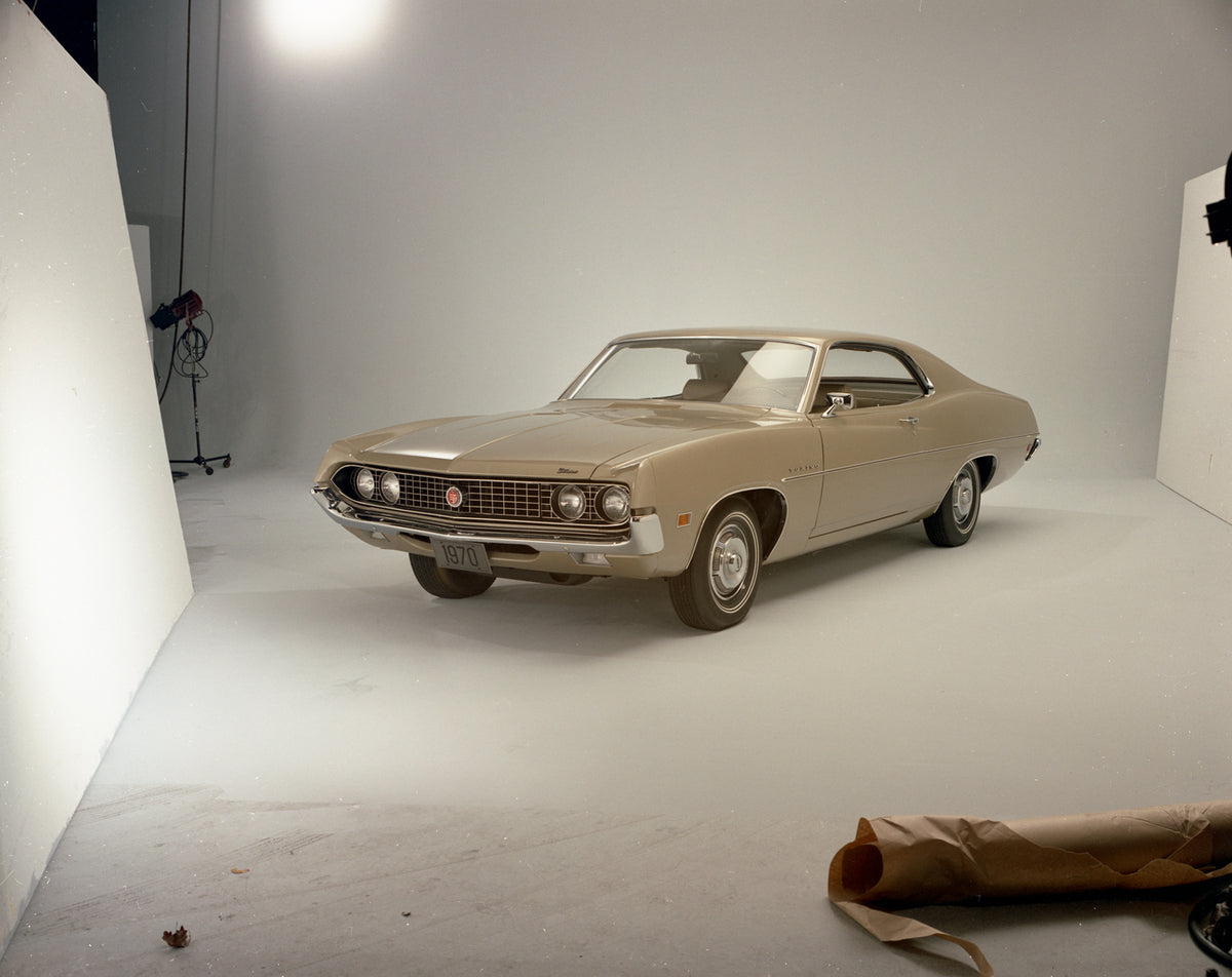 This archival image documents the 1970 Ford Torino two-door hardtop in studio and is preserved in the Ford Heritage Vault as part of Ford Motor Company's historic photographic archive. Free for personal, non-commercial use. Ford Heritage Vault ref...