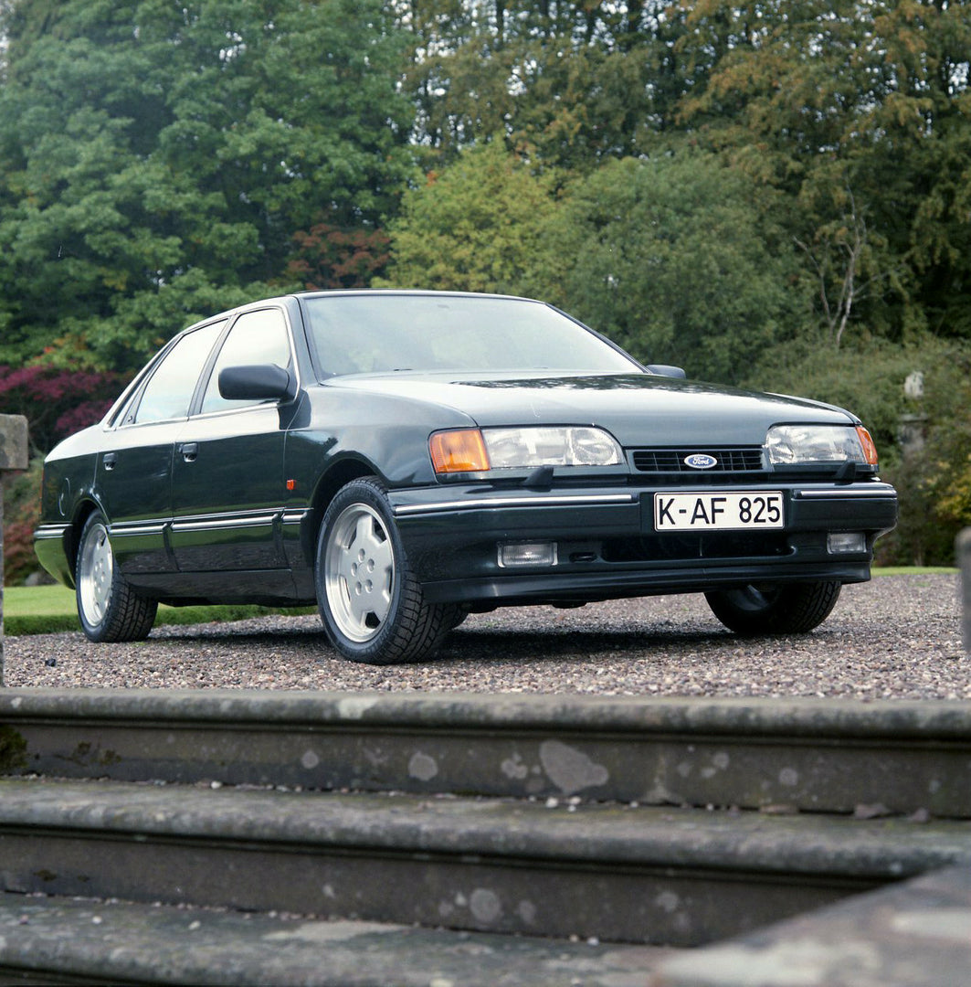 This archival image documents the 1990 Ford Scorpio Cosworth 24 Valve Mark I on scenic grounds and is preserved in the Ford Heritage Vault as part of Ford Motor Company's historic photographic archive. Free for personal, non-commercial use. Ford H...