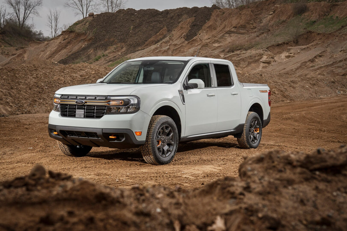 This archival image documents the 2023 Ford Maverick Tremor on dirt road and is preserved in the Ford Heritage Vault as part of Ford Motor Company's historic photographic archive. Free for personal, non-commercial use. Ford Heritage Vault referenc...