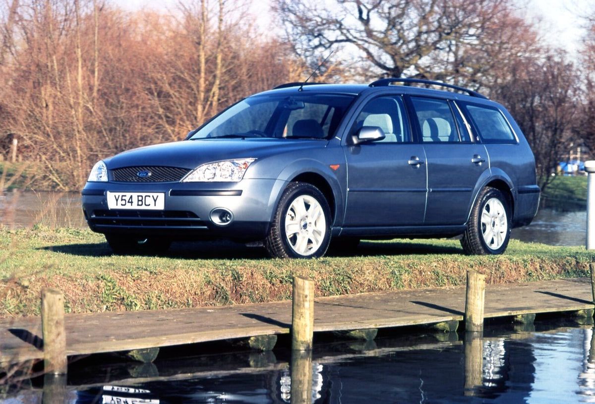 This archival image documents the 2001 Ford Mondeo Mark II Ghia Estate low view near scenic lake with trees and is preserved in the Ford Heritage Vault as part of Ford Motor Company's historic photographic archive. Free for personal, non-commercia...
