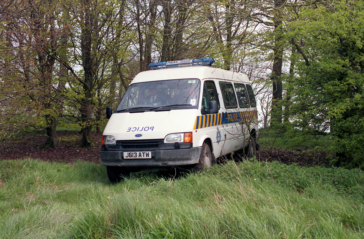 This archival image documents the 1992 Ford Transit Mark III Police Van in scenic forest and is preserved in the Ford Heritage Vault as part of Ford Motor Company's historic photographic archive. Free for personal, non-commercial use. Ford Heritag...