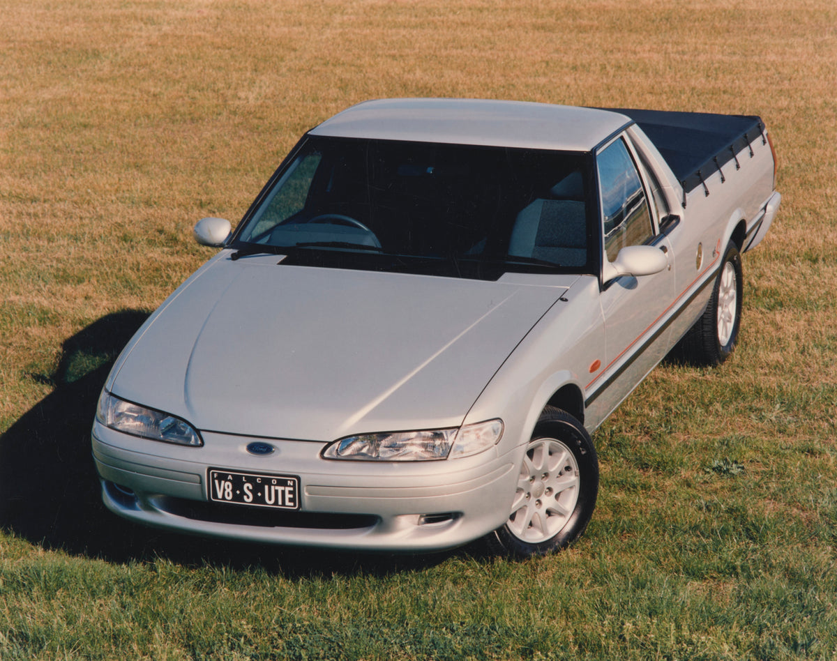 This archival image documents the 1997 Ford XH Falcon S Front End View in a Field FAP-2011-3 and is preserved in the Ford Heritage Vault as part of Ford Motor Company's historic photographic archive. Free for personal, non-commercial use. Ford Her...