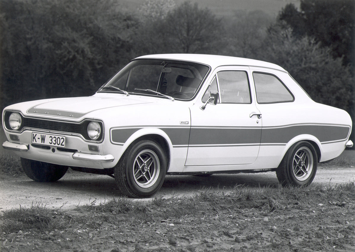 This archival image documents the 1973 Ford Escort Mark I RS2000 on scenic road and is preserved in the Ford Heritage Vault as part of Ford Motor Company's historic photographic archive. Free for personal, non-commercial use. Ford Heritage Vault r...