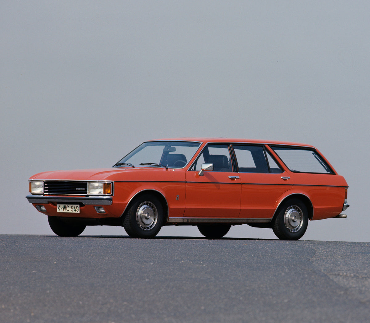 This archival image documents the 1975 Ford Granada Mark I GL with scenic blue sky and is preserved in the Ford Heritage Vault as part of Ford Motor Company's historic photographic archive. Free for personal, non-commercial use. Ford Heritage Vaul...