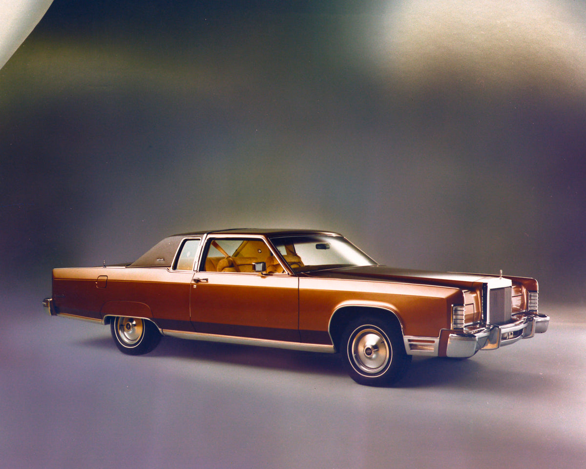 This archival image documents the 1977 Mercury Grand Marquis two-door in studio and is preserved in the Ford Heritage Vault as part of Ford Motor Company's historic photographic archive. Free for personal, non-commercial use. Ford Heritage Vault r...