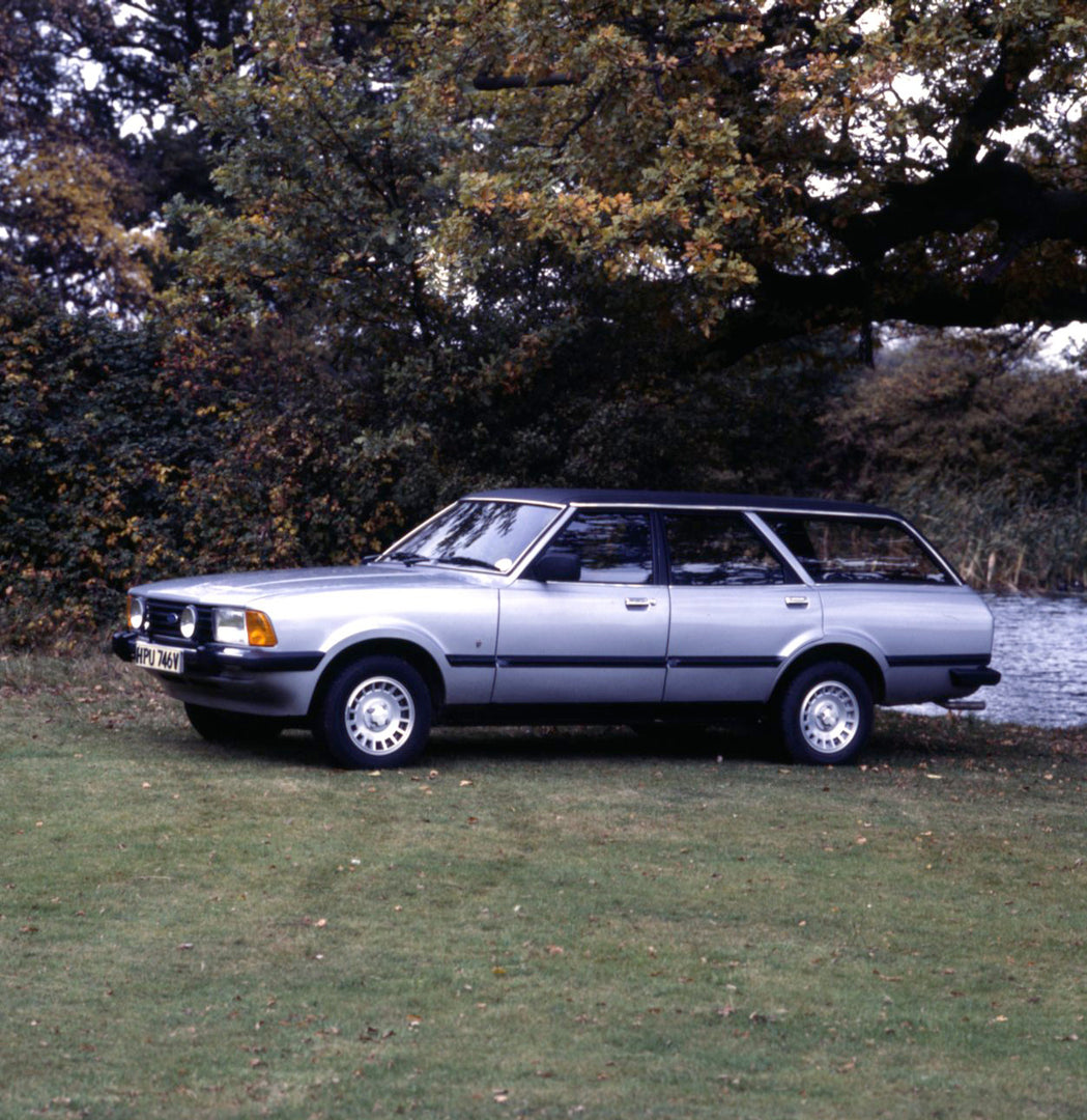 This archival image documents the 1979 Ford Cortina MK IV Ghia Estate side view with scenic trees and river and is preserved in the Ford Heritage Vault as part of Ford Motor Company's historic photographic archive. Free for personal, non-commercia...