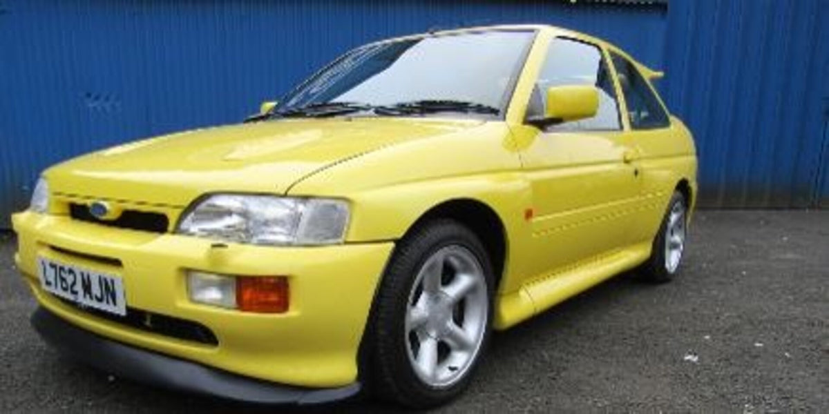This archival image documents the 1993 Ford Escort Mk V Cosworth and is preserved in the Ford Heritage Vault as part of Ford Motor Company's historic photographic archive. Free for personal, non-commercial use. Ford Heritage Vault reference AR-202...