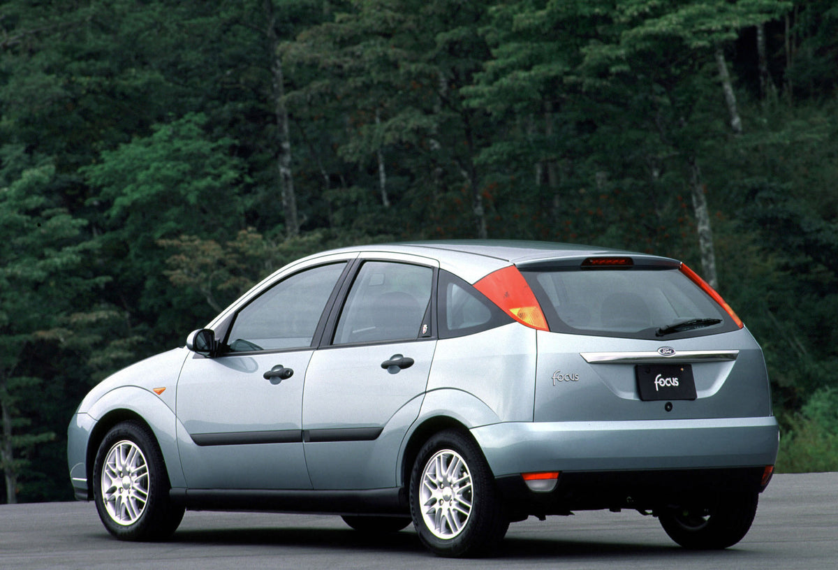 This archival image documents the 2001 Ford Focus Ghia rear view with scenic trees MS504439 and is preserved in the Ford Heritage Vault as part of Ford Motor Company's historic photographic archive. Free for personal, non-commercial use. Ford Heri...