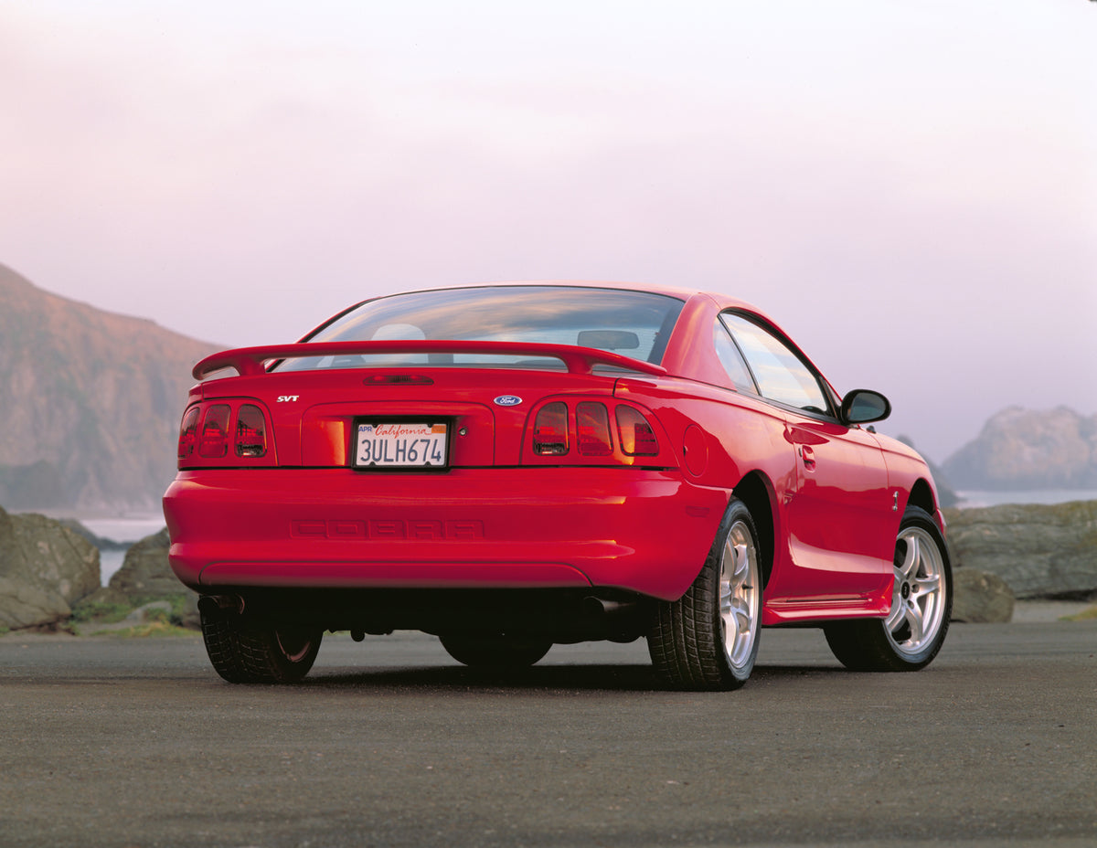 This archival image documents the 1998 Ford Mustang Cobra GT coupe and is preserved in the Ford Heritage Vault as part of Ford Motor Company's historic photographic archive. Free for personal, non-commercial use. Ford Heritage Vault reference AR-2...