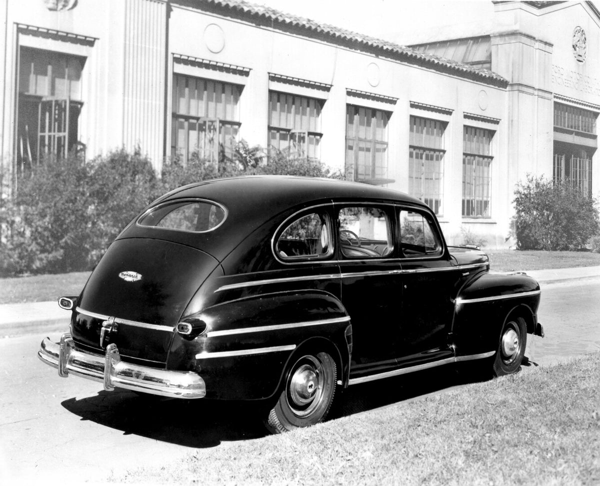 This archival image documents the 1946 Monarch Sedan rear view on street in front of building AR-2007-5 and is preserved in the Ford Heritage Vault as part of Ford Motor Company's historic photographic archive. Free for personal, non-commercial us...