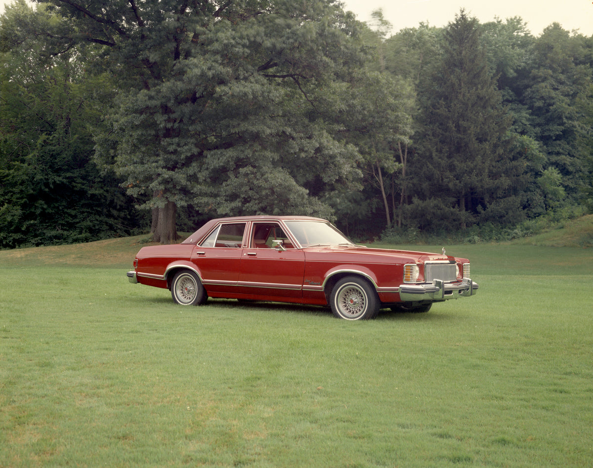 This archival image documents the 1976 Mercury Monarch Grand Ghia four-door with Trees in Background and is preserved in the Ford Heritage Vault as part of Ford Motor Company's historic photographic archive. Free for personal, non-commercial use. ...