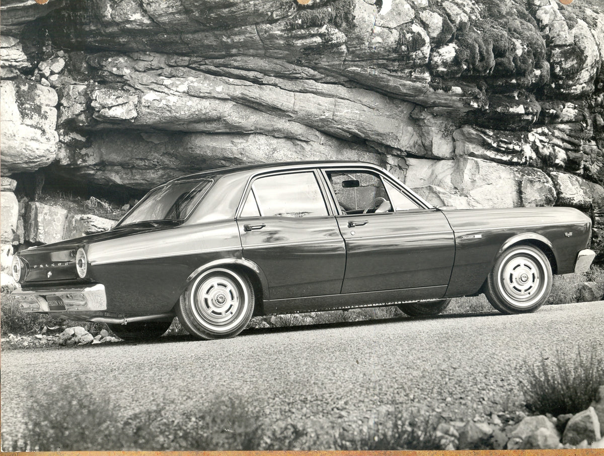 This archival image documents the 1966 Ford XR Falcon 500 side view with scenic rock formation and is preserved in the Ford Heritage Vault as part of Ford Motor Company's historic photographic archive. Free for personal, non-commercial use. Ford H...