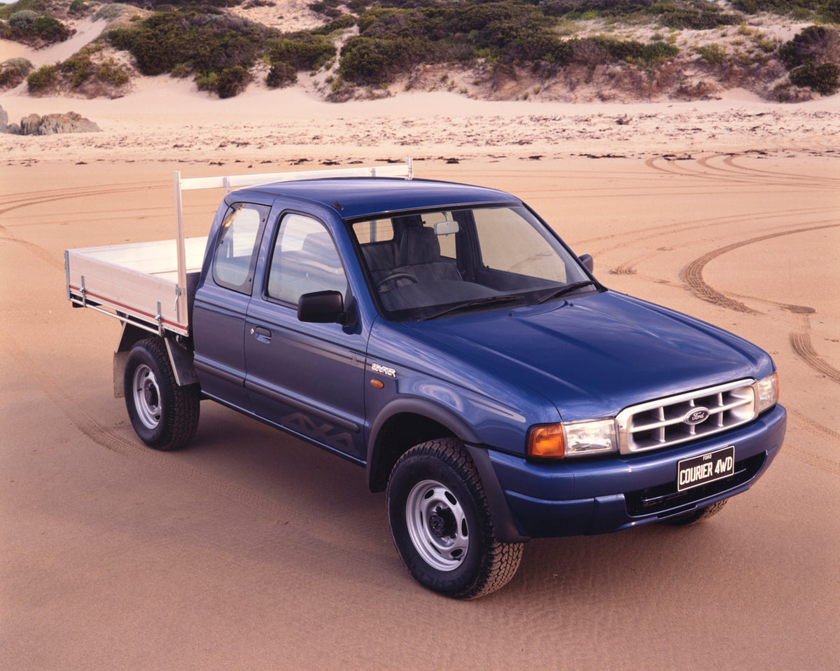 This archival image documents the 1999 Ford Courier 4WD Pickup Truck Driver Side Front End View on the Beach FAP-2011-3 and is preserved in the Ford Heritage Vault as part of Ford Motor Company's historic photographic archive. Free for personal, n...