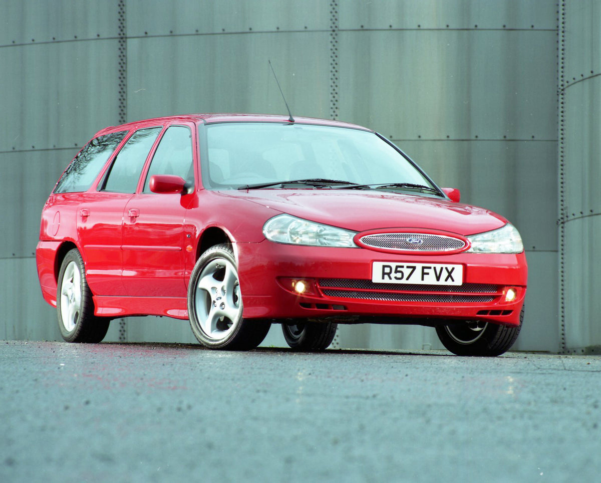 This archival image documents the 1998 Ford Mondeo Mark II ST24 Estate in front of metal wall and is preserved in the Ford Heritage Vault as part of Ford Motor Company's historic photographic archive. Free for personal, non-commercial use. Ford He...