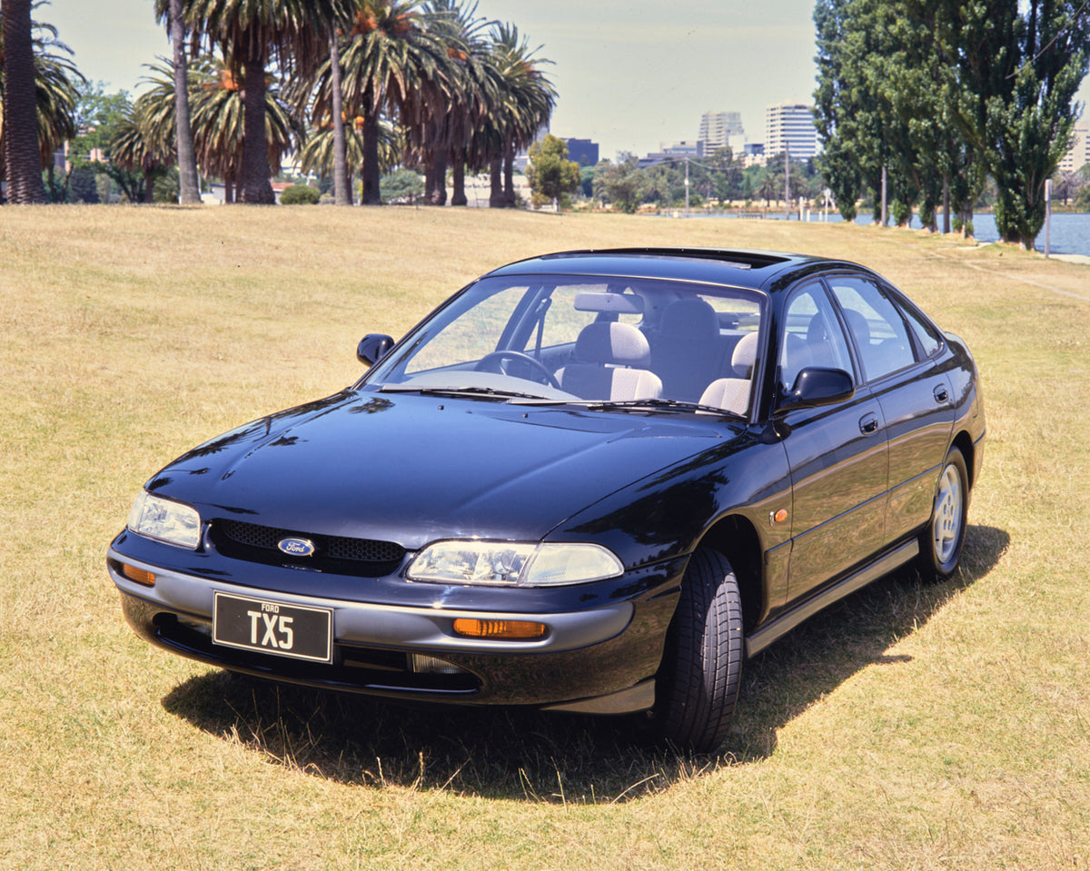 This archival image documents the 1995 Ford AY Telstar TX5 Passenger Side Front End View in the Park FAP-2011-3 and is preserved in the Ford Heritage Vault as part of Ford Motor Company's historic photographic archive. Free for personal, non-comme...