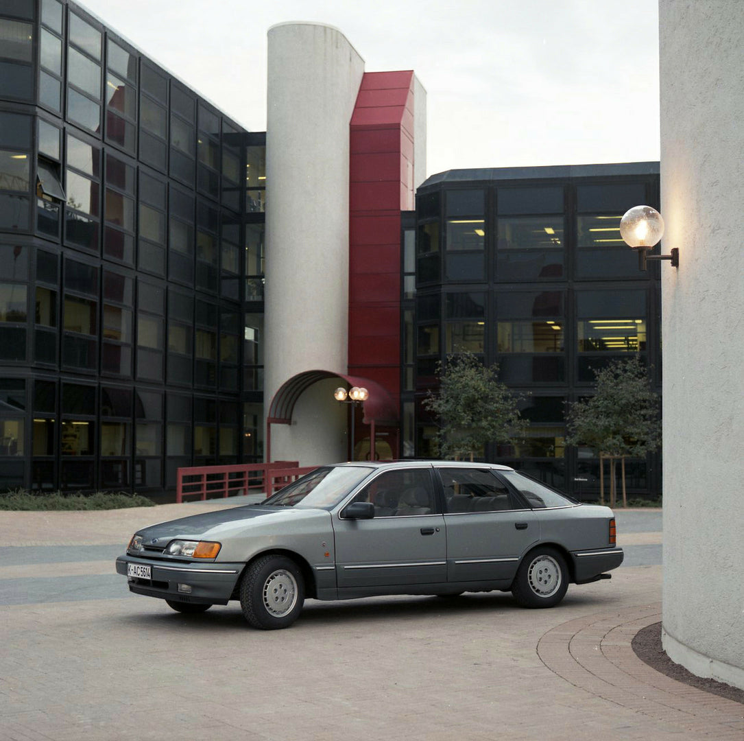 This archival image documents the 1986 Ford Granada Mark III Ghia in front of scenic building in Norway and is preserved in the Ford Heritage Vault as part of Ford Motor Company's historic photographic archive. Free for personal, non-commercial us...