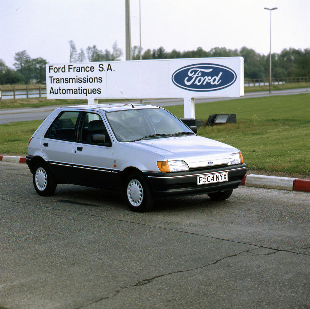 This archival image documents the 1989 Ford Fiesta Mark III Ghia in front of Ford building in Bordeaux, France and is preserved in the Ford Heritage Vault as part of Ford Motor Company's historic photographic archive. Free for personal, non-commer...