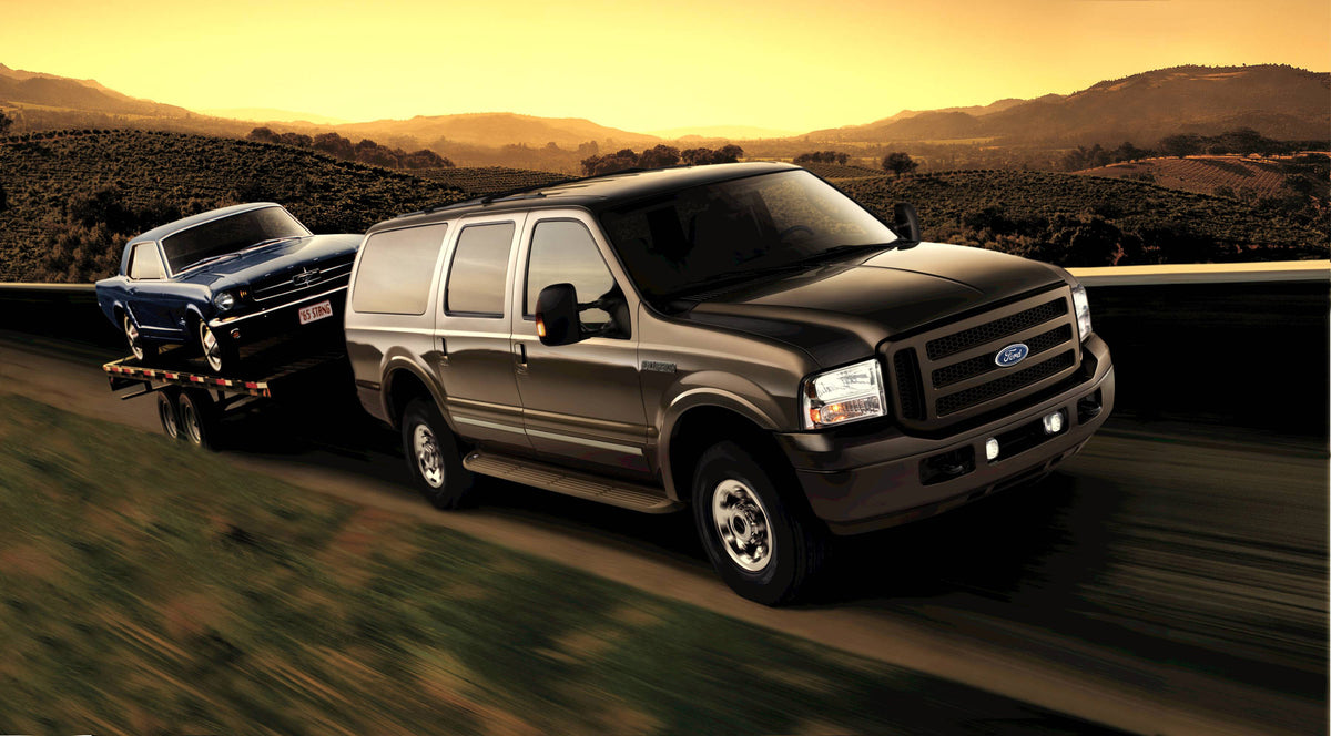 This archival image documents the 2005 Ford Excursion towing Mustang on trailer and is preserved in the Ford Heritage Vault as part of Ford Motor Company's historic photographic archive. Free for personal, non-commercial use. Ford Heritage Vault r...
