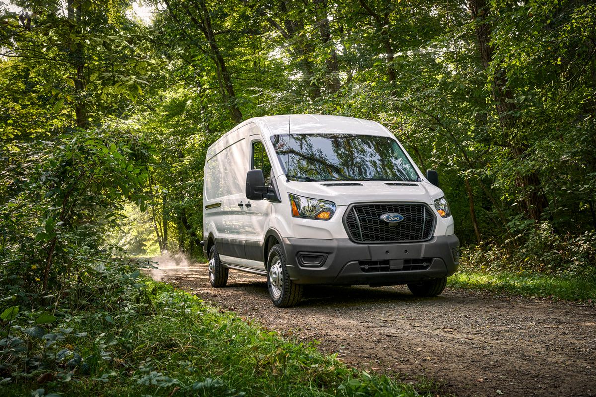This archival image documents the 2021 Ford Transit on scenic road MS and is preserved in the Ford Heritage Vault as part of Ford Motor Company's historic photographic archive. Free for personal, non-commercial use. Ford Heritage Vault reference A...